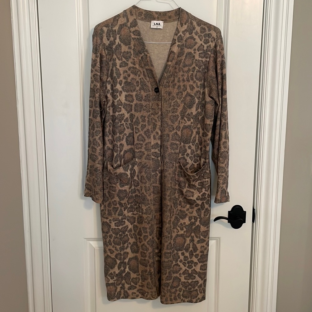 One of this seasons trend…leopard.  This sweater is a must have this season